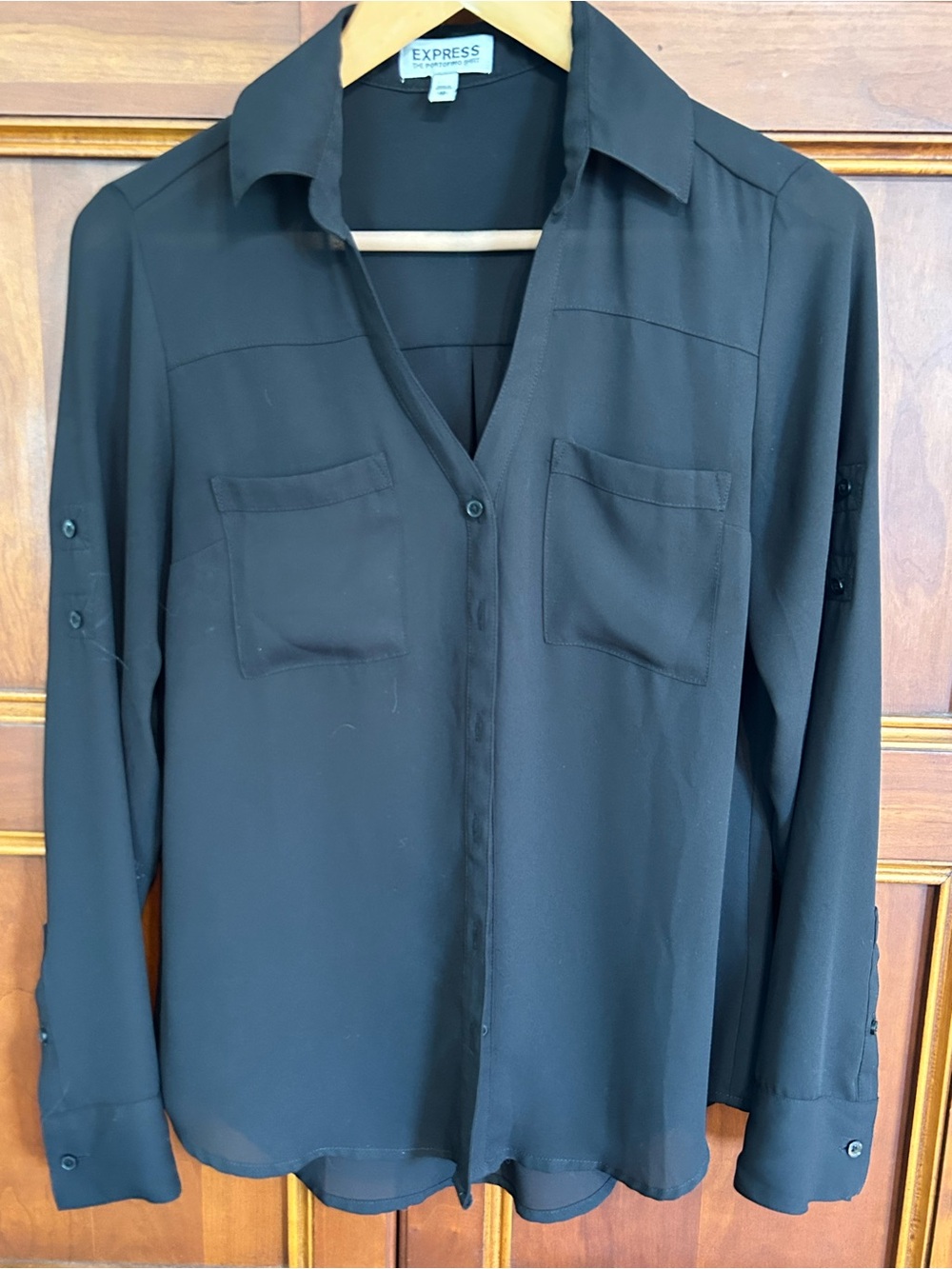Express Women's Black Button-Front Blouse.
Size XS